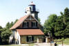 I retired from Federal Civil Service in June 2002 and 
				we went on a cross-country trip to the West Coast in Jul 2002 - for several purposes: 
				visit relatives, attend a military reunion in Colorado, and sightsee the western 
				states. My first stop as in Wisconsin to visit our daughter and in Door County we 
				saw this light house overlooking Green Bay.