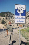 Following US 50 across the western states, this sign can be seen on 
				the west side of Ely, NV, where they are proud that US 50 is commonly known through this part 
				of the west as “the loneliest road in America.”