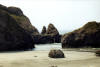 If you look real close, you can see a passageway under one of the rocks in this view of the Oregon Coast. 