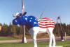 Last, but not least, this artwork is on US 2, near the intersection with I-75, on the Upper Peninsula of Michigan.  It seems to be a patriotic statement for “Northern Exposure” or “Bullwinkle Goes To Washington.”