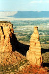 We headed west on July 19, 2003 to attend our son’s wedding in Las Vegas, NV.  I-70 continues to have numerous construction sites but once across the Mississippi River, the speed picks up.  The Colorado National Monument, outside Grand Junction, CO, provided a view I had not seen before.  Of many ridge top views, one of the striking sights in the late afternoon sun was Independence Monument.  In the background is Grand Junction, CO.  