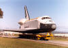 A marker in our space history is the shuttle.  Though the Enterprise never took a powered flight, it was the test bed for all of the shuttles.  Here the Enterprise is being transported around Vandenberg AFB, CA, to test the vehicle’s compatibility with ground transport.  Though Vandenberg never became operational as a launch site, Space Launch Complex 6 was modified as an alternative site and this ground transport vehicle was to be used to transport the shuttle between various complexes.