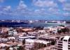 Guam my Isle of Golden Dreams, dreams of you and me, Here we are on Guam, without a hope of snow Guam Paradise! Welcome to my island. These are some of Ol’Islander’s collection of “Glimpses of Guam!” Agana, the capitol, renamed to the native name - Hagatna, is in the foreground and is located on the western shores facing the Philippine Sea.