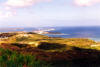 Beyond Asan is the village of Piti where Cabras Island is connected to Guam and where the main electrical power generating plant and the commercial port are located. Stretching out from Cabras Island is Glass Breakers, built to protect Apra Harbor from the northern exposure.